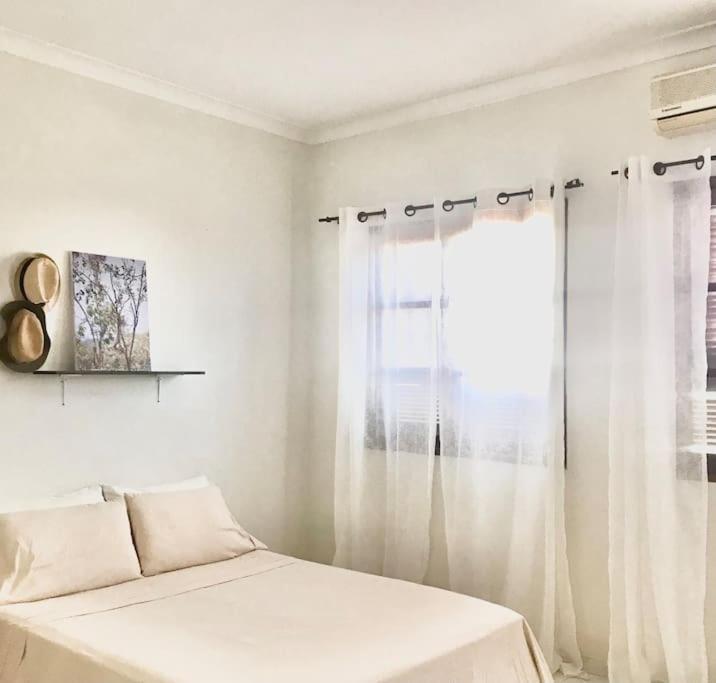 Syds Beach House Praia Bagian luar foto